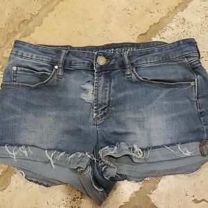 Distressed denim shorts